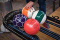 hand taking a bowling ball from the machine. Royalty Free Stock Photo