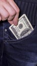 Hand taking money from pocket Royalty Free Stock Photo