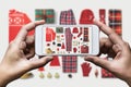 Hand taking photo of Christmas theme Flat lat Lay Royalty Free Stock Photo