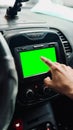 Hand Tapping on Car Infotainment System (Green Screen) Royalty Free Stock Photo