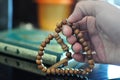 Hand with tasbih or rosary