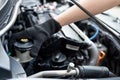 Hand Technician checking brake fluid in engine room maintenance and basic service concept of the car and brake system Royalty Free Stock Photo