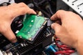 Hand of Technician Installing a Desktop Hard Drive ,check and re