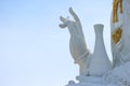 Hand of Thai famous big white bodhisattva guanyin statue with copy space sky background at Wat Huai Pla Kung temple, Chiang rai. Royalty Free Stock Photo