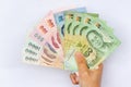 Hand with thailand moeny Royalty Free Stock Photo