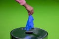 Hand throwing away blue disposable gloves medical  chroma screen Royalty Free Stock Photo