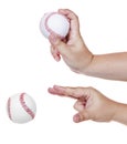 Hand throwing baseball isolated Royalty Free Stock Photo