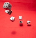 Hand throwing dice, hoping for the best odds Royalty Free Stock Photo