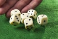 Hand throwing dices Royalty Free Stock Photo