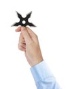 Hand is throwing ninja shuriken