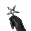 Hand is throwing ninja shuriken