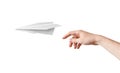 Hand is throwing origami paper airplane. Isolated on white Royalty Free Stock Photo