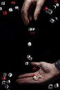 The hand throws dice, the hand catches dice, the concept of chance. Probability theory. Probability. Luck. Royalty Free Stock Photo