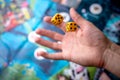 The hand throws two yellow dice on the playing field. The concept of Board games. Gaming moments in dynamics