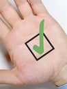 Hand with tick sign