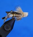 Hand tied fly fishing fly Royalty Free Stock Photo