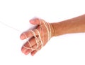 Hand tied with thread Royalty Free Stock Photo