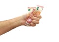 Hand tightening 10 euros banknotes isolated on Royalty Free Stock Photo