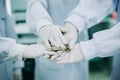 Hand together of medical doctor in research scientist laboratory. Concept for collaboration of health care professional. Royalty Free Stock Photo