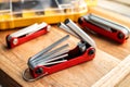 Hand tools,Folding Hex Key Set on desk. Folding Hex Key design for slipping in pocket or for easy storage Royalty Free Stock Photo