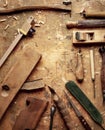 Hand tools Wood (Drill Jig Saw plane chisel) on an old wooden workbench Royalty Free Stock Photo