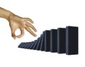 Hand toppling dominoes isolated