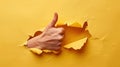 The hand through torn paper.AI generated image Royalty Free Stock Photo