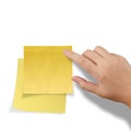 Hand touch blank yellow sticky note Royalty Free Stock Photo