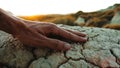 Hand Touch Cracked Dry Ground Royalty Free Stock Photo