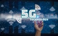 Hand touch icon 5G network wireless system internet of things cover,background city landscape and skyscrapers modern,concept Smart Royalty Free Stock Photo