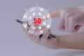 Hand touch infographic on mobile phone of fifth generation wireless technology for digital cellular networks or 5G . Royalty Free Stock Photo