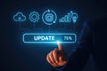 Hand Touching Update Progress Bar at 75% with Cloud and Technology Icons software update upgrade Royalty Free Stock Photo