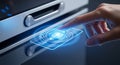 Close up of a human finger interacting with a futuristic holographic digital interface on a modern appliance control panel Royalty Free Stock Photo