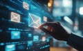 Hand touching digital envelopes on a screen, concept of email distribution. Royalty Free Stock Photo