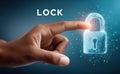 Hand touching a digital padlock representing cybersecurity and modern technology Royalty Free Stock Photo
