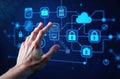 Hand touching a digital screen with icons of technology and online network connection, cloud storage Royalty Free Stock Photo