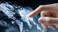 Hand touching digital world map on interactive display Royalty Free Stock Photo