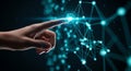 Hand touching glowing network node with interconnected digital connections and cyan particles Royalty Free Stock Photo