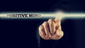 Hand Touching Positive Mind Statement on Touch Screen