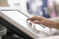 Hand Touching Screen Of Cash Register