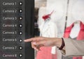 Hand Touching Security camera App Interface clothes shop Royalty Free Stock Photo