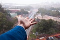 hand touching the snow while snowing Royalty Free Stock Photo