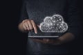 Hand touching tablet with cloud computing and online storage concept. Cloud computing concept - connect devices to cloud Royalty Free Stock Photo