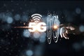 Hand touching to 5G wireless network telecommunication and mobile internet signal. Internet of thing IOT high speed and change the