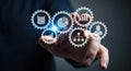 Hand touching virtual gears with data management and business analytics icons Royalty Free Stock Photo