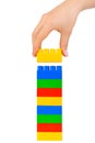 Hand and toy tower Royalty Free Stock Photo