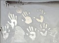 Hand trace on the frozen winter glass. hand prints on frozen glass, cold, frost, winter