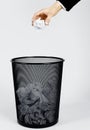 Hand and trashcan Royalty Free Stock Photo
