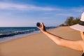 Hand traveler woman holding compass at the beach,Navigation for travel,Close up