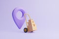 Hand truck with brown cardboard boxes and violet location pointer on pastel lilac background Royalty Free Stock Photo